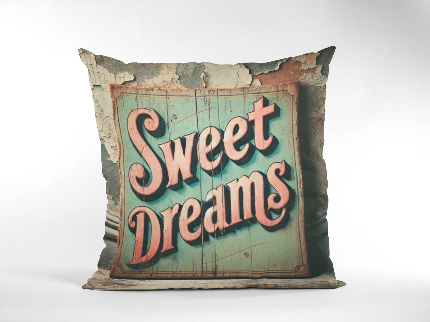 Vintage-style throw pillow with a distressed wooden sign that reads "Sweet Dreams" in retro, bold lettering on a faded teal background.